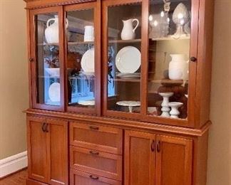 $1500 Custom Made by Local Craftsmen, 100% solid wood hutch. This cabinet is the ultimate storage & display piece as the glass doors slide open allowing for more aerial space throughout. This cabinet is in meticulous condition and will last a lifetime! 74”x18”x81” 