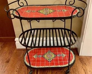 Front of 3 shelve Pier One tiled bar cart