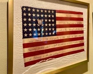 $30 Betsy Nimock (American, 20th Century) “Honesty” Flag Series, hand signed This is a beautiful Flag “Honesty” poem elegantly written on the white lines of the American Flag  