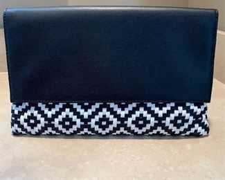$48 Deaux Lux Black and White woven Clutch-in perfect condition