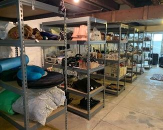 There are many solid, metal shelving units avail! Loaded with fantastic household finds! 