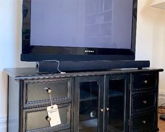 Perfectly scaled for a smaller space, this media console offers a timeless look and useful storage. 