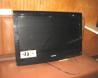 Flat Screen TV, Paper Benjamin Franklin Bill is for Size Comparison