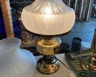 #39	glass globe brass base lamp 	 $45.00 
