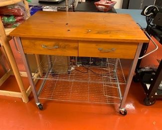 #132	wood /metal cart 37x24x34 with drawer and on wheels 	 $150.00 
