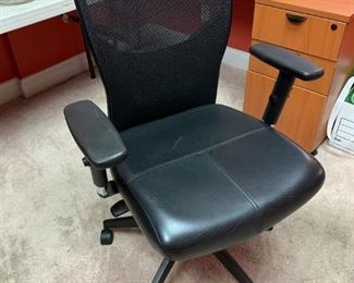 #161	black desk chair with mesh on back 	 $65.00 
