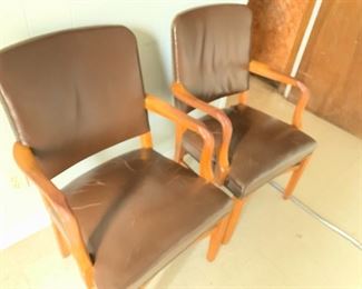 #175	2 brown leather wood arm nail head side chairs $50 ea heavy	 $100.00 
