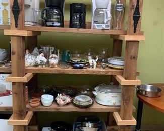 #165	rough wood shelf on wheels 5 shelves 32x25x77	 $200.00 
#166	rough wood double shelf on wheels that fold on top for easy moving  88x26x78	 $300.00 

