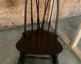 #211	black arched rocking chair	 $40.00 
