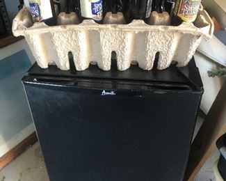 mini fridge with very spikey hairdo