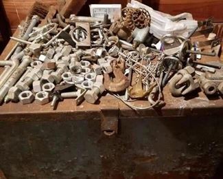 Huge metal box and large amount of nuts, bolts, screws