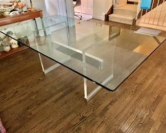 $950 - Contemporary Dining Table with Glass Top and Lucite and Metal Base; As is: two chips in the glass near one corner; 29.5" H x 80" x 44" 