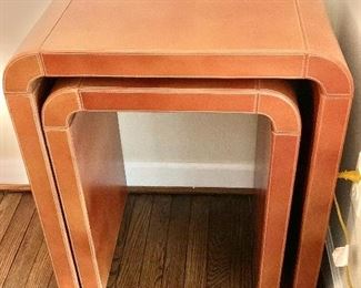 $295 - Pair of Leather Covered Nesting Tables; largest is 27" H x 15" D x 24" W (smaller is 24" H x 15" D x 18" W