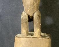 African Tribal Mask with Kneeling Figure