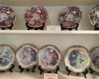 Floral Greetings by Lena Liu (top shelf). Flights of Fancy by Lena Liu (bottom shelf).