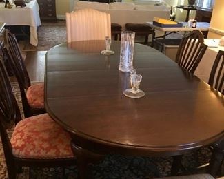 Ethan Allen dining room table, 80" x 43" with leaves.  Lovely pair of host/hostess upholstered chairs. Set of 4 vintage wood Hepplewhite side chairs. Table and 4 side chairs sold as a set.