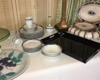Depression glass cake stand. Excel "Caravel" china (center): tea cups, saucers, dinner plates, salad plates, dessert bowls, sugar bowl. Gibson Housewares china (right): tea cups, saucers, dinner plates, oval platter, creamer and sugar bowl.