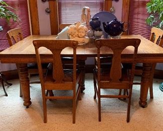 Antique Oak Table and Chairs, 2 leaves and pad.