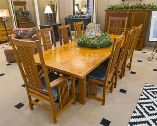 This beautiful set was purchased for approximately $15,000.  The chairs are 'Stickly', and the table was custom made in Mexico.