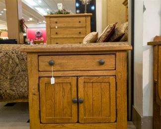 Nightstand that is part of a beautiful king bedroom suite!