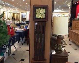 Colonial Co. mid century modern Grandmother clock made of rosewood really nice looking.