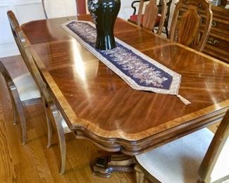 Inlaid Wood with some minor scratches - Table with 6 chairs and one leaf - $600