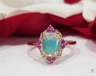 14 K Rose Gold Ethiopian Opal, Ruby and Diamond Ring