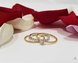 Three Delicate 18K Gold Diamond Rings