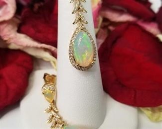 14K Yellow Gold Drop Ethiopian Pear Shaped Opal and Diamond Earrings