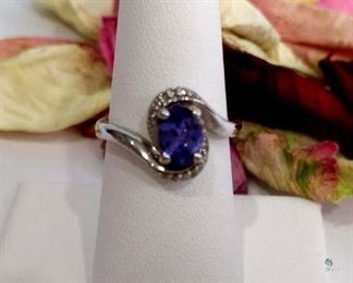 Oval Cut Tanzanite and Diamond .925 Silver Ring