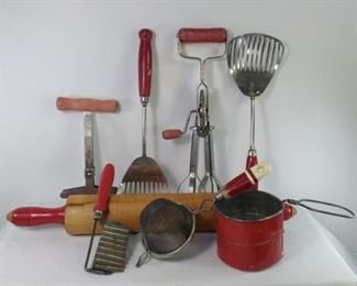 Vintage red handled kitchen utensils