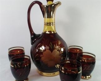 Vintage amber glass decanter set etched in gol