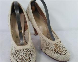 Antique bridal shoes with shoe shape savers