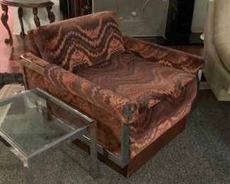 LOT #113 - $400 - Groovy Chrome Upholstered Lounge Chair with Wood Base (some scratches on wood)