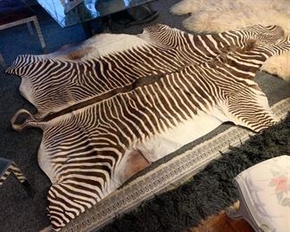 LOT #138 - $500 - Zebra Hide Rug