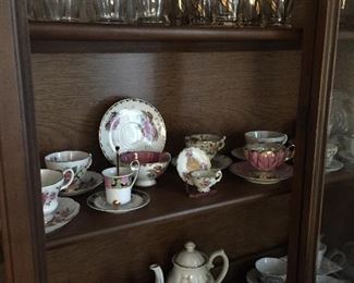 Antique glassware, teacups & teapots.