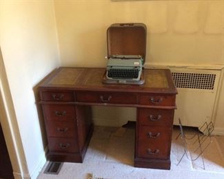 Nice leather top desk.  Vintage type writer