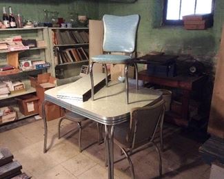 vintage set.  Three of the chairs are rip seats