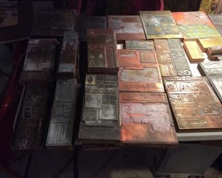 a tableful vintage printing blocks
