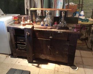 very old 100 plus wood work bench. Very unique and very heavy.  