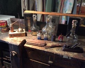 Jack Daniels bottles, oil cans , wood planes