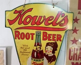 Howell's Root Beer metal sign