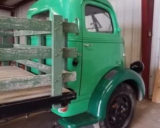 1947 Ford Green Truck with Tommy lift.  Needs engine work