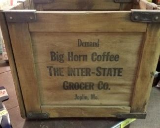 Wooden and metal advertising box, lots of other boxes too