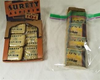 Surety aspirin display with several packages and port of Beaumont matches in original box