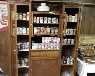 Antique cabinet and old beer cans