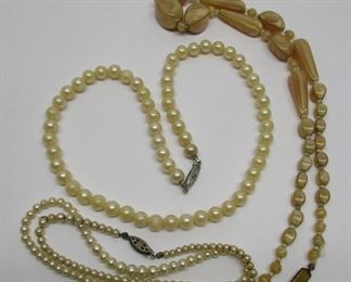 Two vintage faux pearl necklaces - one with sterling clasp
A Deco period mother of pearl like bead necklace with original old clasp