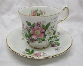 English tea cup and saucer by Paragon.  Flower Festival pattern.  
