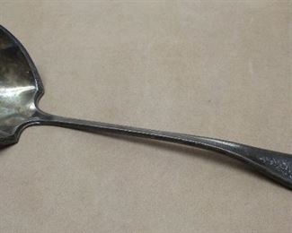 A vintage Roger's Brothers silver plated punch ladle with unusual decoration on the rim of the bowl area