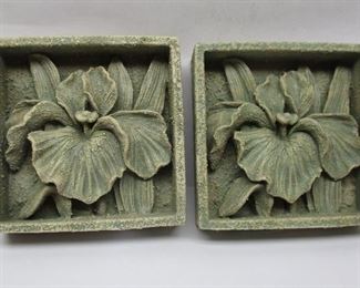 Pair of composition floral wall plaques with impressed Cherison signature.  3.75" x 3.75" 